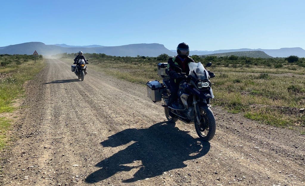 The group ride on along a straight road.