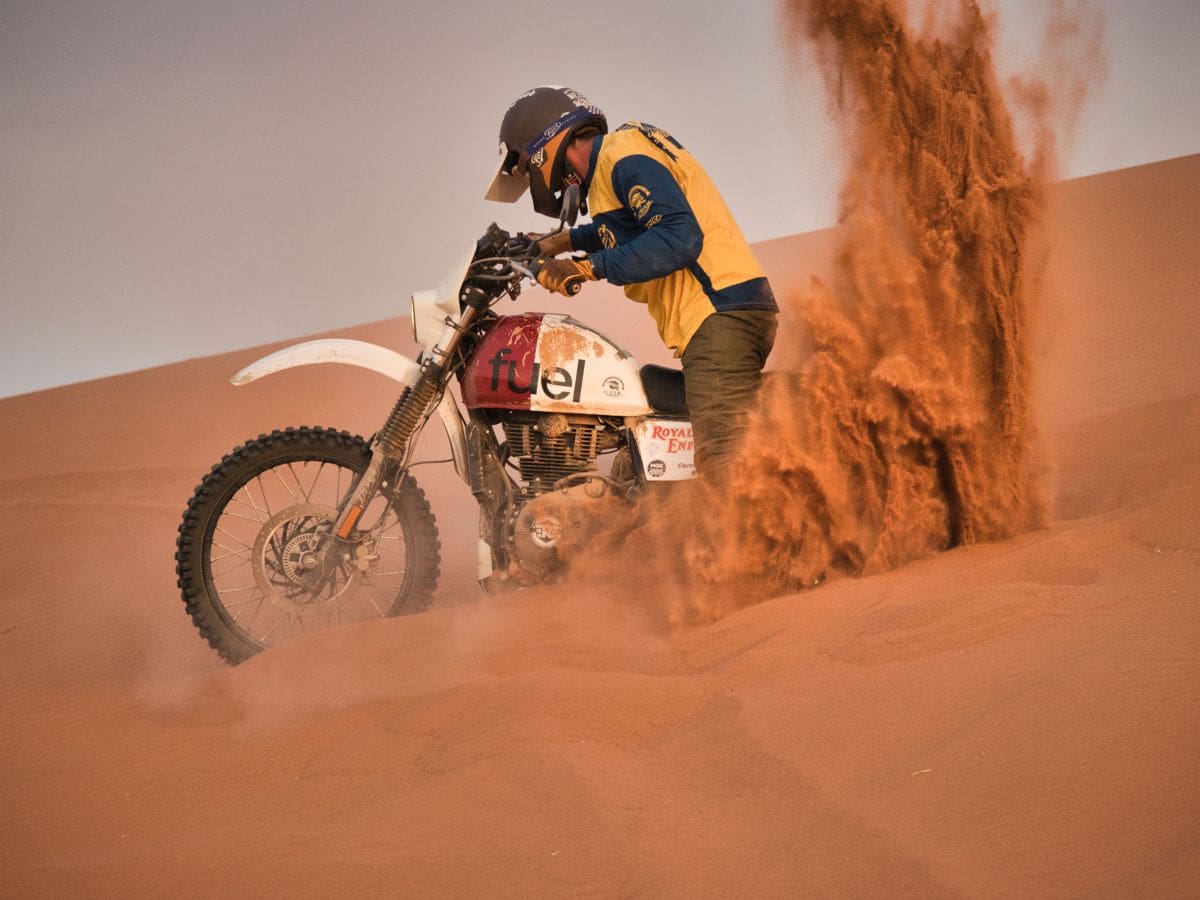 Scram Africa bike in sand